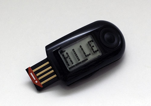 Charge the Nike+ SportBand Link by connecting it to a USB port