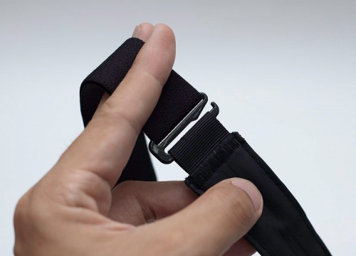 Metal hook of the strap that catches onto a fabric loop Metal hook of the strap that catches onto a fabric loop