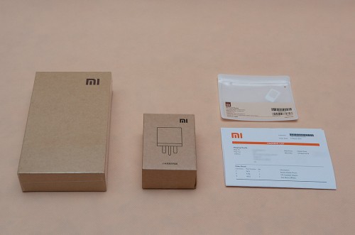 Redmi Smartphone, UK Power Adapter, SIM card sleeve, Packing list